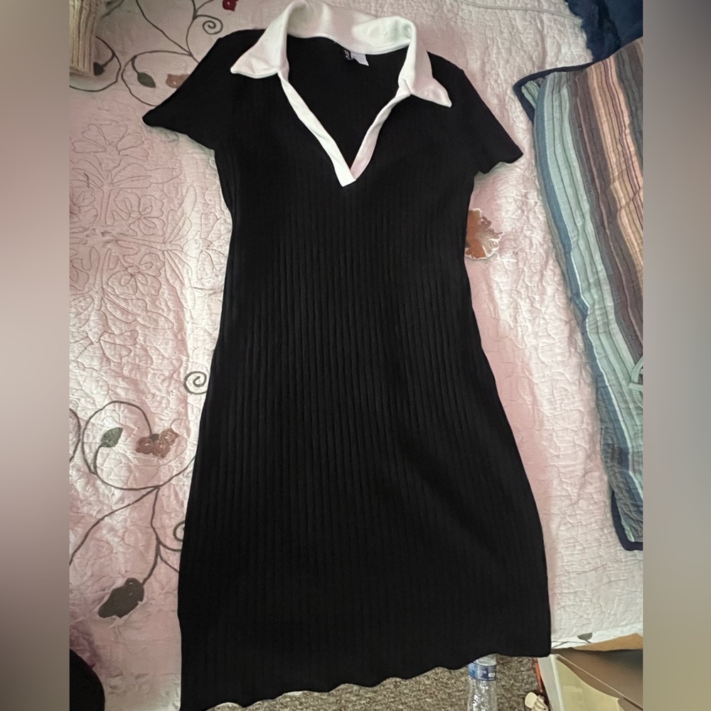This is a beautiful simple black dress that fits very well and is comfortable.